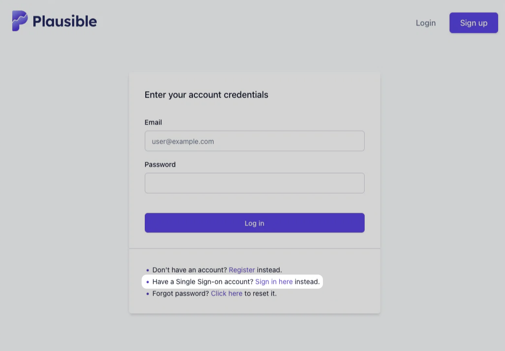 Plausible email-and-password login form with a separate Sign in here link for Single Sign-On accounts